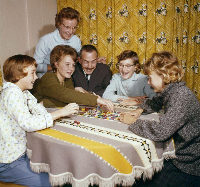family playing a board game