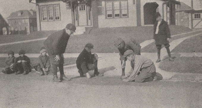 boys playing marbles